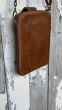 Load image into Gallery viewer, Rear view of genuine leather phone wallet crossbody showing smooth leather finish and zip around closure.