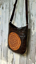 Load image into Gallery viewer, Full view of the Boho Rustic Soul Mandala Leather Crossbody Bag handcrafted from genuine leather with a detailed hand-tooled mandala centre panel and adjustable crossbody strap. Designed in Australia by Dreamtime Boho.