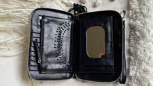 Load image into Gallery viewer, Open leather boho wallet showing card slots, zip coin pocket and internal mirror