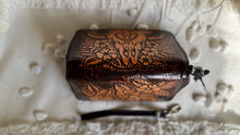 Load image into Gallery viewer, Top view of hand tooled buffalo leather boho wallet showing zip closure
