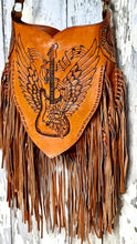 Load image into Gallery viewer, Rock guitar fringe leather crossbody bag front view with adjustable hand detailed strap and fringe.