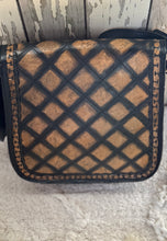 Load image into Gallery viewer, Back view of hand tooled leather crossbody bag showing diamond tooled pattern and genuine leather finish