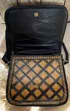 Load image into Gallery viewer, Interior view of hand tooled leather crossbody bag showing magnetic flap zip closure and storage compartments
