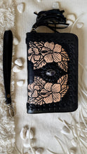 Load image into Gallery viewer, Black hand tooled leather boho wallet with hibiscus floral design, natural stone feature and wristlet strap by Dreamtime Boho