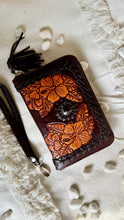 Load image into Gallery viewer, Brown hand tooled leather boho wallet with hibiscus floral design, natural stone feature and wristlet strap