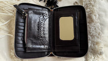 Load image into Gallery viewer, Open leather boho wallet showing internal mirror, zip coin compartment and storage sections