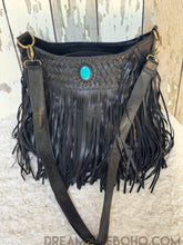Load image into Gallery viewer, Black fringe leather boho western bag featuring handwoven leather detail and turquoise gemstone accent, handcrafted statement crossbody handbag.