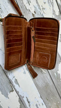 Load image into Gallery viewer, Interior of genuine leather phone wallet featuring 14 card slots, zip coin pouch, note compartments and spacious phone pocket.