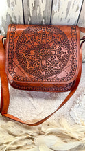 Load image into Gallery viewer, Tan hand tooled mandala leather crossbody bag in genuine leather with adjustable strap and boho artisan design by Dreamtime Boho