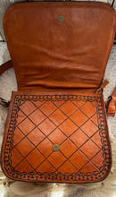 Load image into Gallery viewer, Interior view of tan genuine leather crossbody bag showing magnetic flap zip closure and spacious compartments