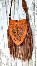 Load image into Gallery viewer, Winged guitar boho leather fringe handbag close up front detail in tan genuine leather.