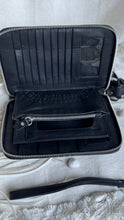 Load image into Gallery viewer,     Interior of Azura Mandala leather wallet showing card slots, zip coin pocket and compartments