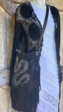 Load image into Gallery viewer, Side angle of black leather snake fringe crossbody boho bag featuring handpainted artwork and soft genuine leather.
