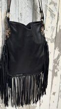 Load image into Gallery viewer,     Rear view of black genuine leather boho bag with long cascading leather fringe.