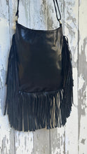 Load image into Gallery viewer, Rear view of black genuine leather fringe boho crossbody bag with long leather fringe and adjustable strap