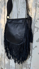 Load image into Gallery viewer, Back view of black leather fringe crossbody bag with soft genuine leather and long fringe