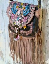 Load image into Gallery viewer, Side view of black Love Story hand painted leather fringe boho crossbody bag by Dreamtime Boho