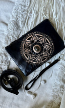 Load image into Gallery viewer, Black genuine leather 3-way crossbody clutch with handcrafted mandala design, gemstone feature, removable wristlet and crossbody strap.
