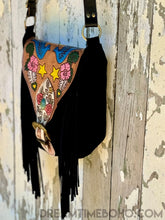 Load image into Gallery viewer, Black suede fringe boho bag side view with hand painted leather detailing and long fringe