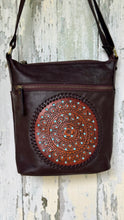 Load image into Gallery viewer, Boho Harmony chocolate brown leather crossbody bag featuring an intricate hand-tooled mandala design with turquoise accents and braided leather edging.