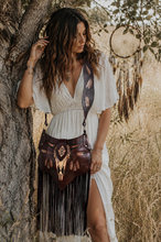 Load image into Gallery viewer, Buffalo Spirit boho leather fringe crossbody bag worn with a white boho dress