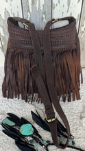 Load image into Gallery viewer, Angled front view of small brown Brooklyn leather fringe crossbody bag with adjustable strap and woven detailing