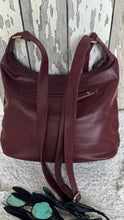 Load image into Gallery viewer, Rear view of small burgundy genuine leather boho bag featuring rear zip pocket and soft slouch style.