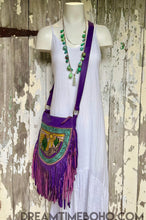 Load image into Gallery viewer, Cactus Desert Sun purple boho leather crossbody bag worn on model, featuring hand tooled artwork and fringe, Dreamtime Boho