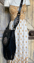 Load image into Gallery viewer, Celeste Lotus boho crossbody bag worn with detailed hand tooled celestial leather shoulder strap