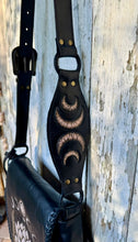 Load image into Gallery viewer, Black leather shoulder strap detail with hand tooled crescent moons and artisan leatherwork