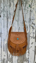 Load image into Gallery viewer, Desert Willow hand tooled tan genuine leather fringe crossbody bag with turquoise gemstone, adjustable strap and boho styling.
