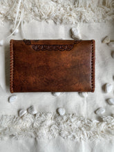 Load image into Gallery viewer, Back view of antique brown genuine leather boho wallet with hand stitched edges.
