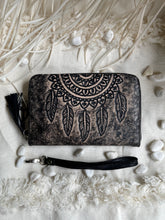 Load image into Gallery viewer, Hand tooled dreamcatcher leather wallet in antique black genuine leather with detailed feather tooling and boho style.