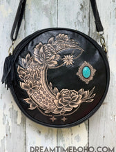 Load image into Gallery viewer, Side view of Rustic Moon round leather boho bag with adjustable strap, designed in Australia by Dreamtime Boho
