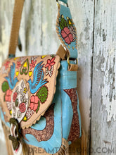 Load image into Gallery viewer, Dreamtime Boho Love Story turquoise leather bag side panel detail with hand painted artwork. Worldwide shipping from Queensland Australia.