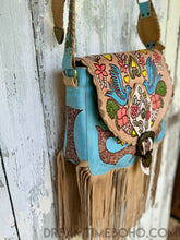 Load image into Gallery viewer, Dreamtime Boho turquoise Love Story hand painted leather fringe bag angled view. Worldwide shipping from Queensland Australia.