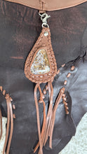 Load image into Gallery viewer, Close up gemstone feature on genuine leather boho bag with hand stitched leather surround and tassel detail