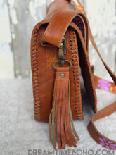 Load image into Gallery viewer, Side view of Groovy Mushroom leather crossbody bag with removable leather tassel