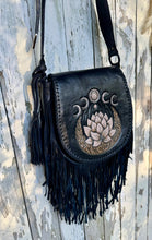 Load image into Gallery viewer, Hand tooled black leather fringe bag featuring lotus flower, moon phases and celestial detailing