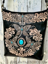 Load image into Gallery viewer, Intricate hand tooled dragonfly artwork on black leather bag with turquoise gemstones