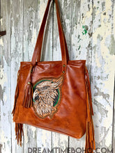 Load image into Gallery viewer, Side angle of luxe hand tooled leather fringe boho tote bag showing layered fringe and craftsmanship, Dreamtime Boho Australia