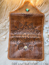 Load image into Gallery viewer, Hand tooled mandala leather wallet open showing detailed artisan leatherwork and turquoise stone
