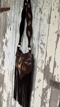 Load image into Gallery viewer, Side view of handcrafted leather fringe crossbody bag with buffalo artwork