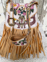 Load image into Gallery viewer, Side view of hibiscus hand painted leather boho fringe bag showing long double fringe detail