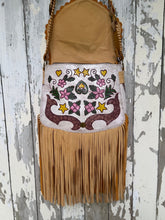 Load image into Gallery viewer, Inside flap of hibiscus hand tooled leather boho fringe crossbody bag showing detailed floral design