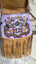 Load image into Gallery viewer, Front under flap panel artwork on Lilac Love Story genuine leather boho fringe bag with hand painted floral details