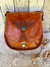 Load image into Gallery viewer, Front view of Luna Moth bohemian genuine leather crossbody bag with turquoise stone