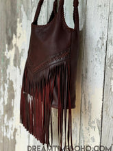 Load image into Gallery viewer, Side view of luxe chocolate brown leather fringe shoulder bag showing depth and movement