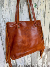 Load image into Gallery viewer, Back view of luxe hand tooled leather fringe boho tote bag with smooth leather finish, designed in Australia by Dreamtime Boho
