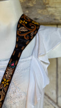 Load image into Gallery viewer, Hand painted leather crossbody strap detail on Luxe Love Story boho bag with floral and heart artwork